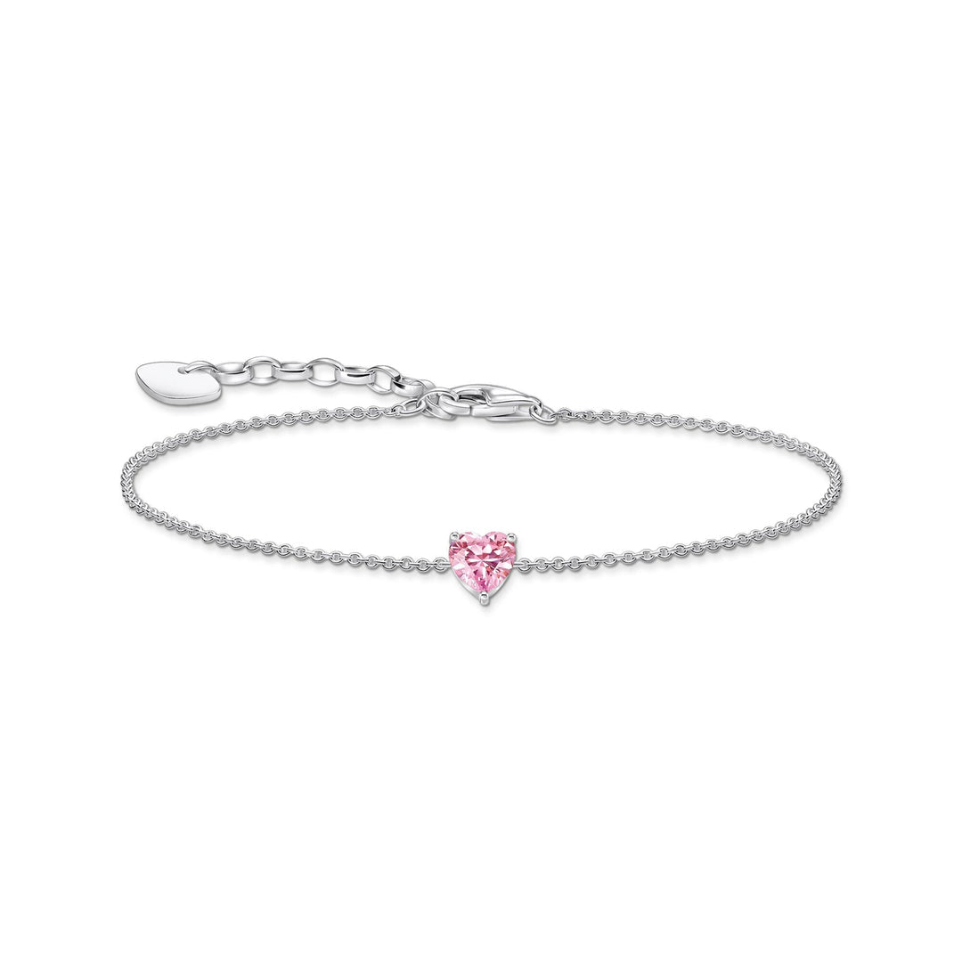 Silver bracelet with a pink heart-shaped charm on a white background